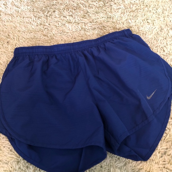 Nike Pants - Nike running shorts size small electric blue